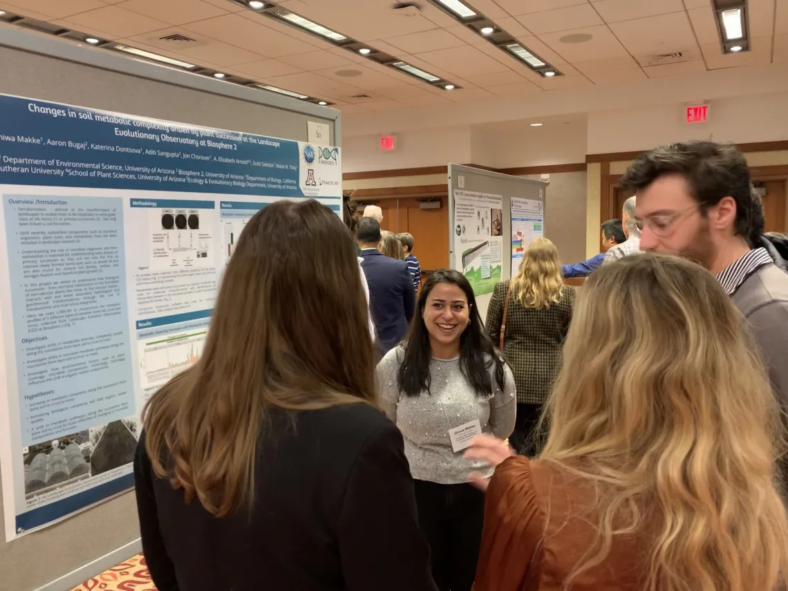 Ghiwa presents her research poster at the NRT Annual Meeting